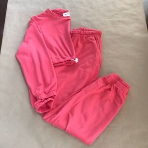 Coral crop top swat pant set.
